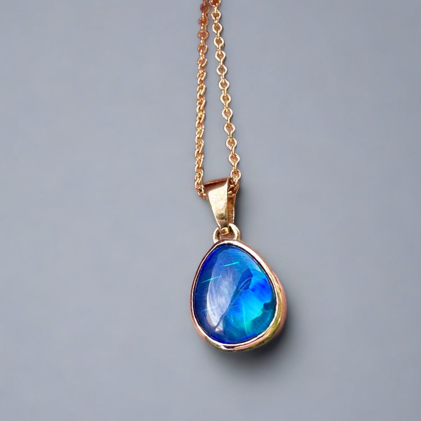 Striking & Unique Australian Black Opal Pendant Set in 9k Gold