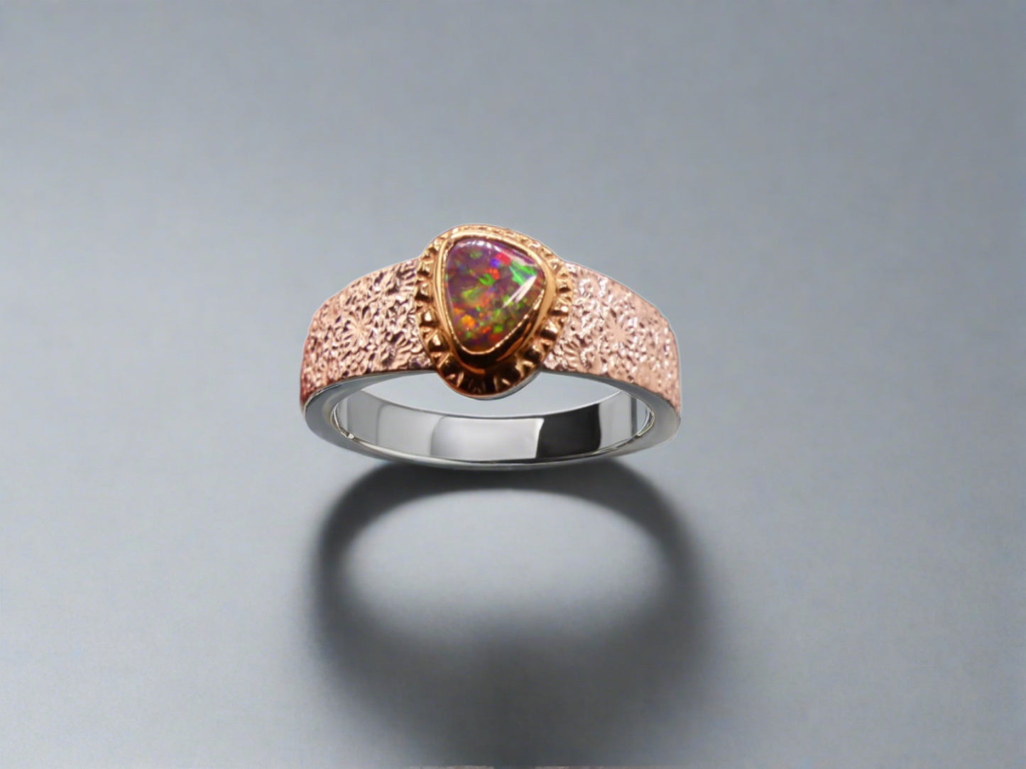 Sterling silver and 9k gold Lightning Ridge Black Opal Ring