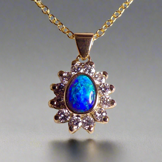 Vibrant sparkling 18K Yellow Gold Black Opal & Diamond Halo Pendant