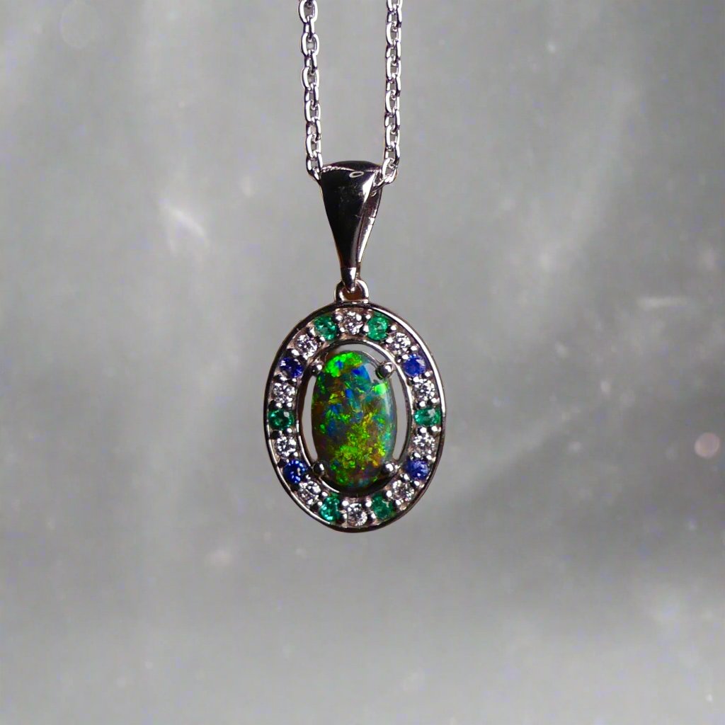 Luxurious White Gold Pendant with Black Opal, Diamonds, Emeralds & Sapphires