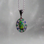 Luxurious White Gold Pendant with Black Opal, Diamonds, Emeralds & Sapphires