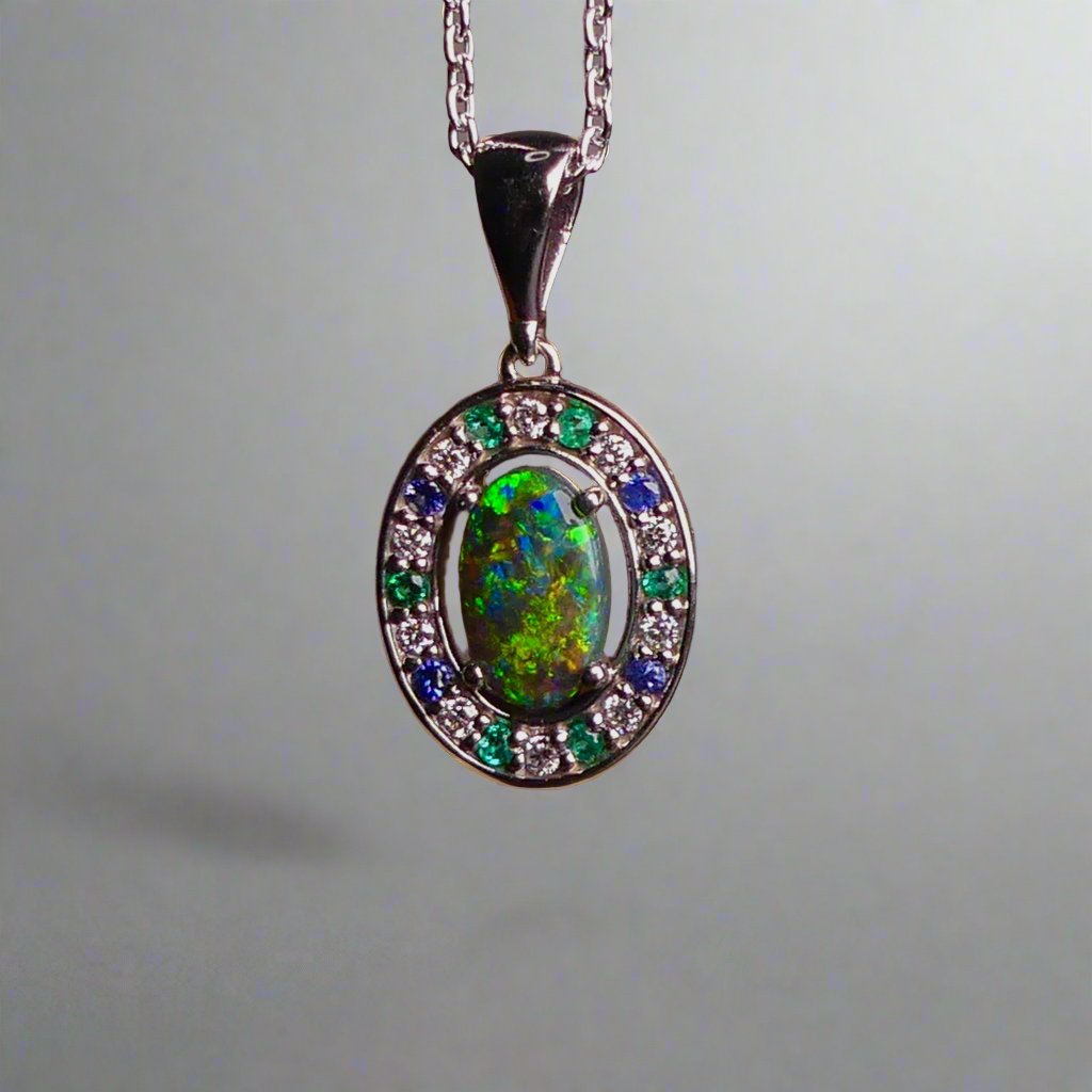 Luxurious White Gold Pendant with Black Opal, Diamonds, Emeralds & Sapphires