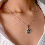 Luxurious White Gold Pendant with Black Opal, Diamonds, Emeralds & Sapphires