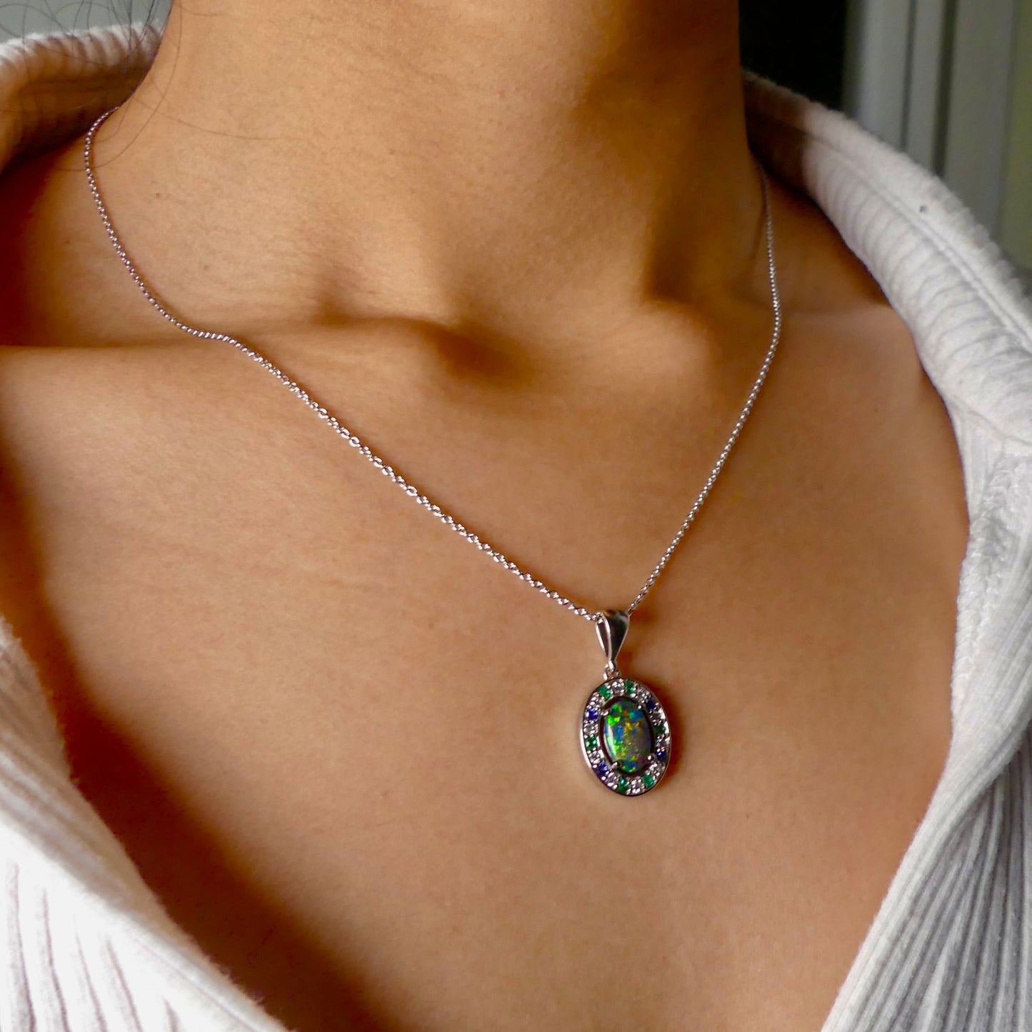 Luxurious White Gold Pendant with Black Opal, Diamonds, Emeralds & Sapphires