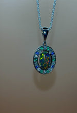 Luxurious White Gold Pendant with Black Opal, Diamonds, Emeralds & Sapphires