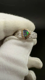 Sterling silver and 9k gold Lightning Ridge Black Opal Ring