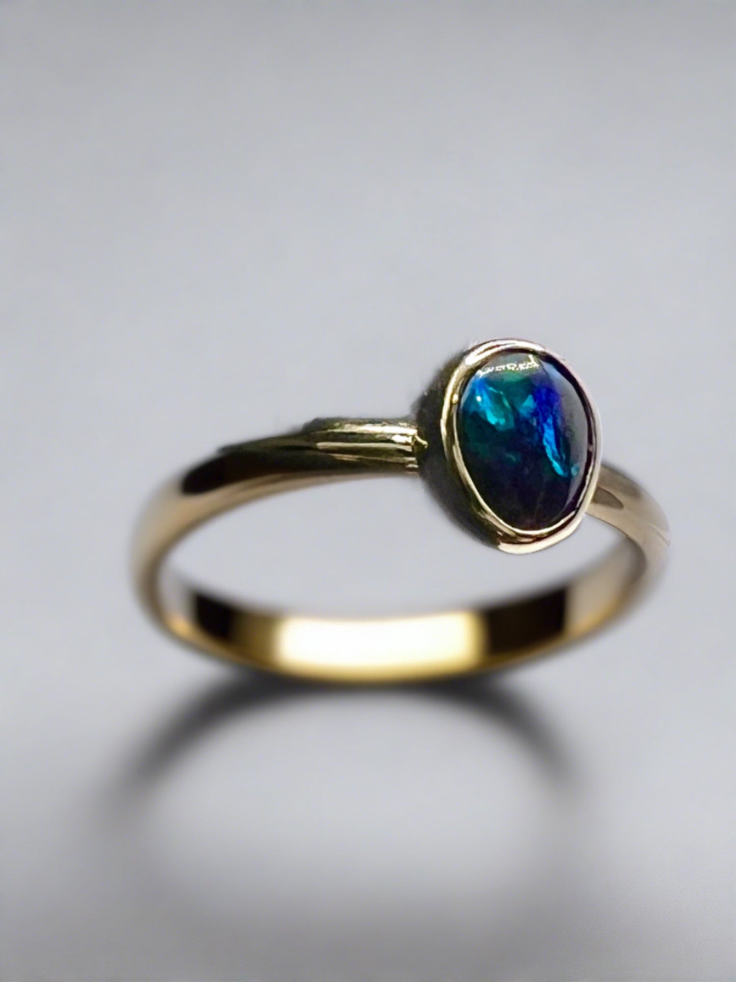 Unique & Luxurious Lightning Ridge Opal Ring in 9k Gold Setting